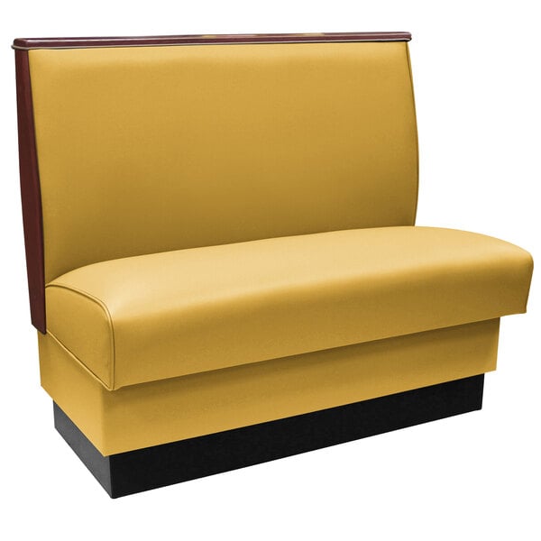 An American Tables & Seating yellow booth with wood end caps and top.