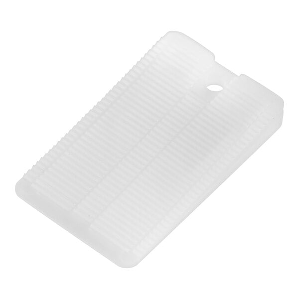 A white plastic tray of Wobble Wedge Tapered table stabilizers.