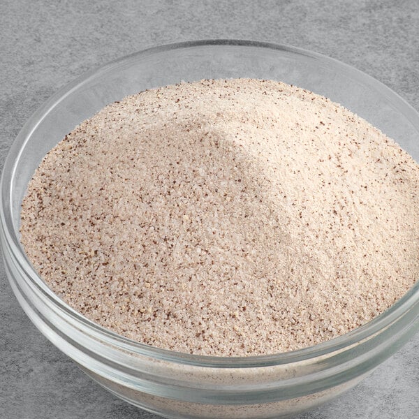 A bowl of UPOURIA French Vanilla Cappuccino mix powder.
