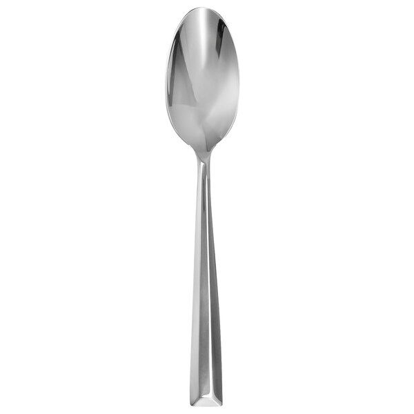 A close-up of a Walco stainless steel teaspoon with a white handle and bowl.