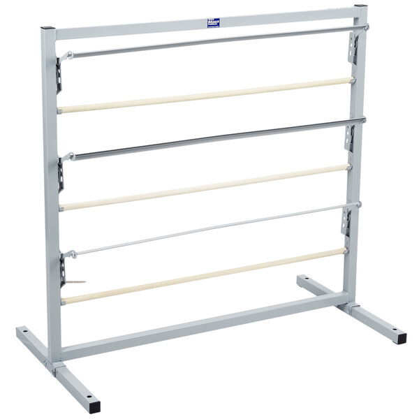 A metal Bulman paper rack with wood bars on it.