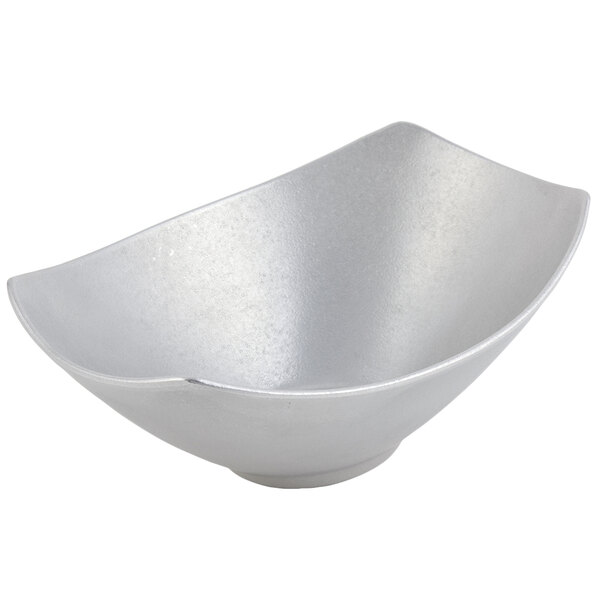 a silver bowl on a white background