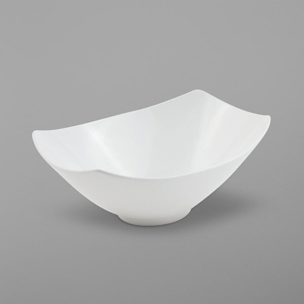 a white bowl on a gray background
