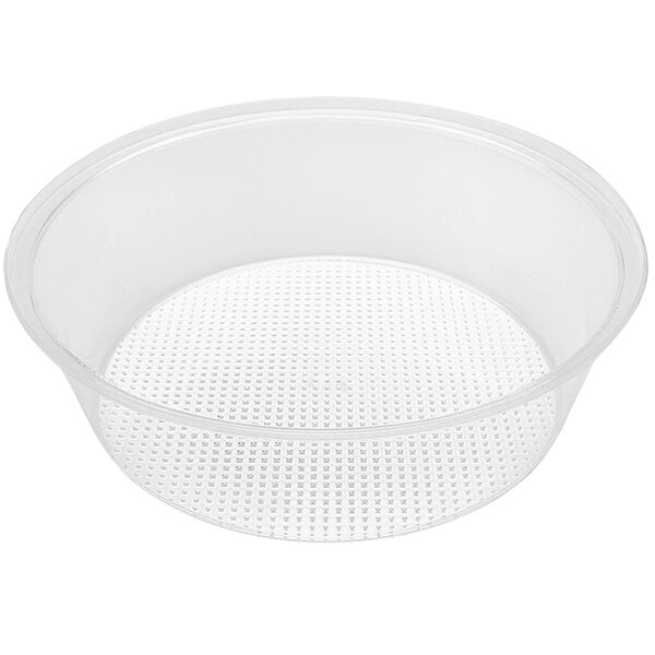 A clear plastic round bowl with holes in it.