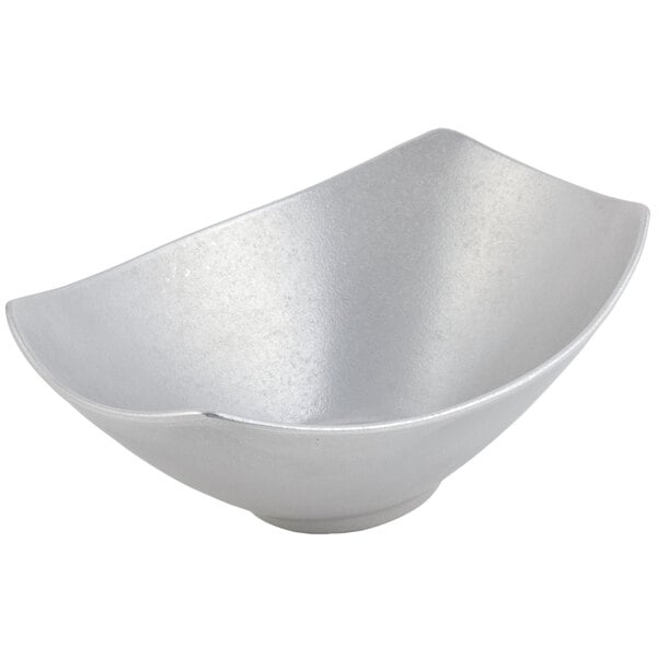 a silver bowl with a white background