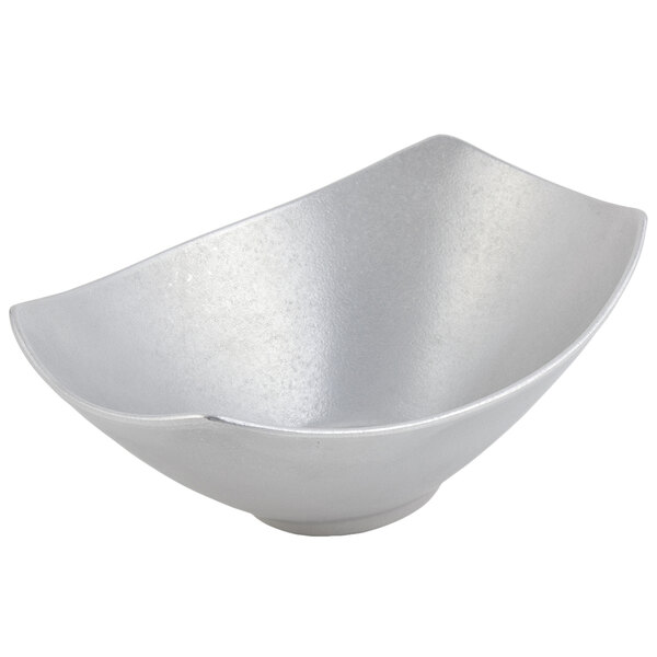 A Bon Chef pewter-glo cast aluminum bowl with a curved edge.