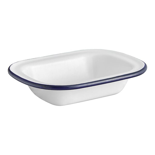 An American Metalcraft white enameled bowl with a blue rim.