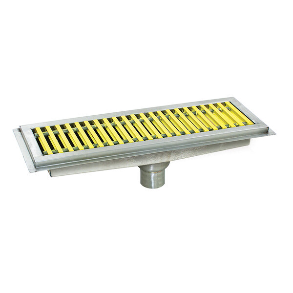 A metal floor trough with yellow fiberglass grating with white stripes.