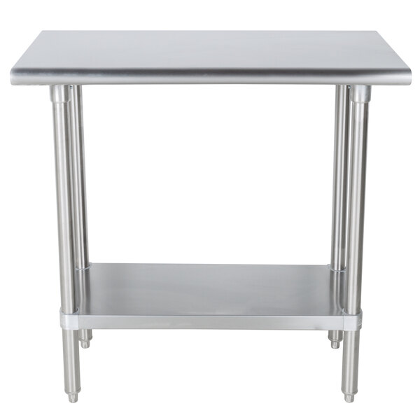 An Advance Tabco stainless steel work table with a stainless steel undershelf.