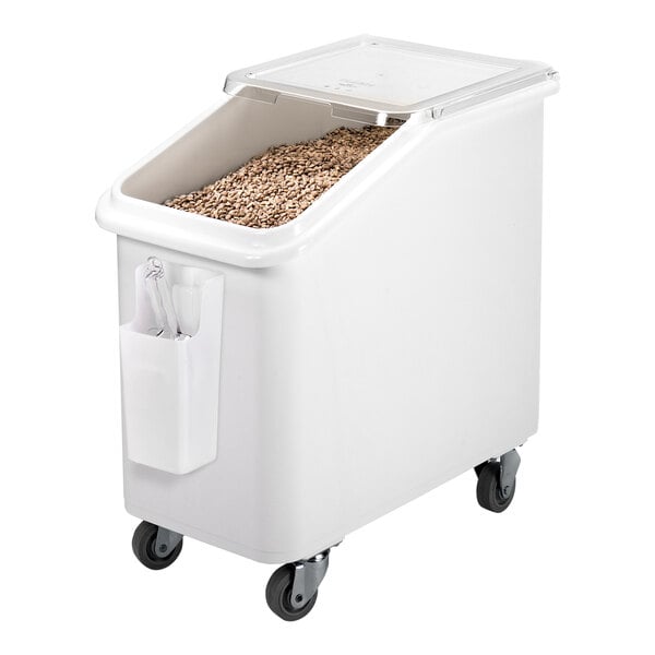 A white Cambro ingredient storage bin with a sliding lid and wheels.