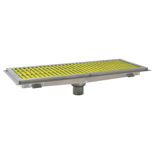 A stainless steel Eagle Group floor trough with yellow fiberglass grating.