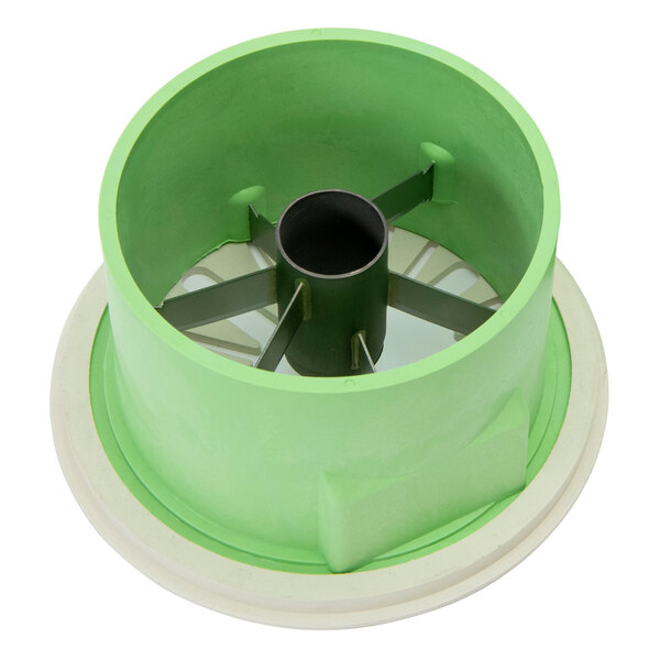 A green circular object with metal blades and a black lid.