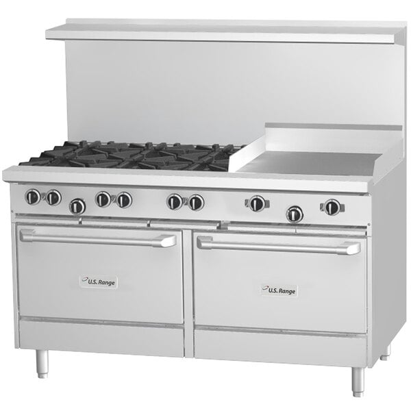 a large white stove with black knobs