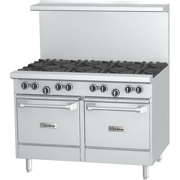 A stainless steel U.S. Range commercial gas range with black knobs and two storage bases.