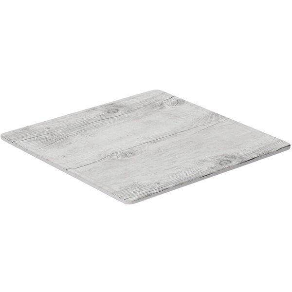 A white square wood GET Madison Avenue display board.