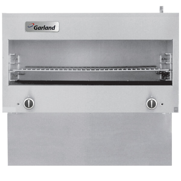 A stainless steel Garland cheese melter with two infrared burners and a black shelf.