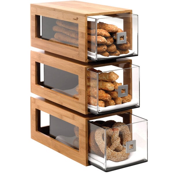 A Rosseto bakery pastry display with three drawers full of food.