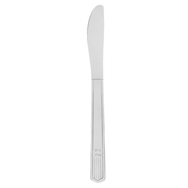 A silver dinner knife with a white handle.