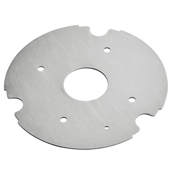 A circular metal Sunkist base plate with holes.