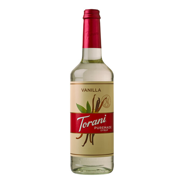 A close-up of a Torani Puremade Vanilla flavoring syrup bottle.