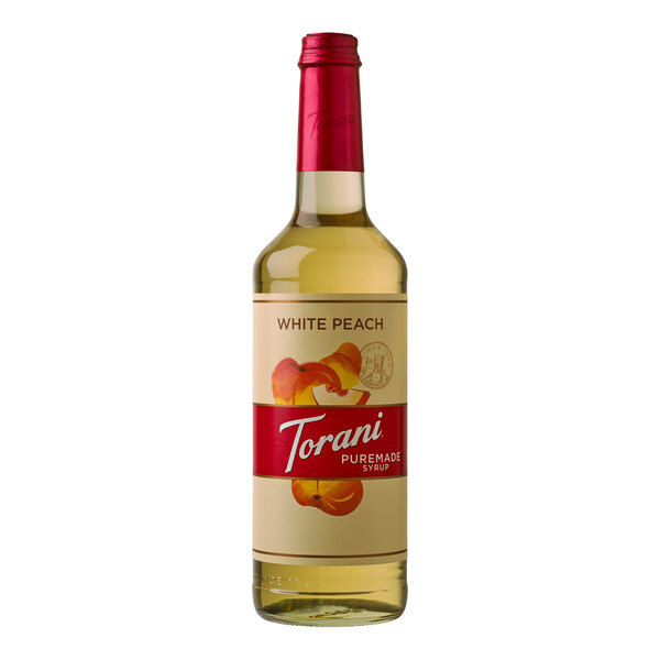 A Torani Puremade White Peach Flavoring Syrup bottle.