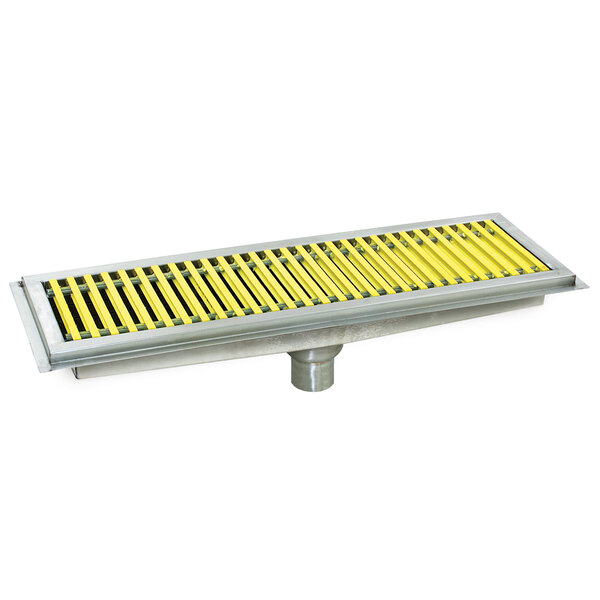 A metal floor trough drain with yellow fiberglass grating.