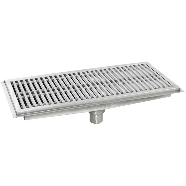 A metal Eagle Group floor trough with a stainless steel grate.