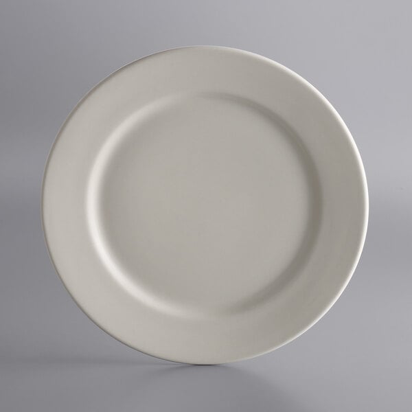 A close-up of a Libbey white stoneware plate with a round edge.