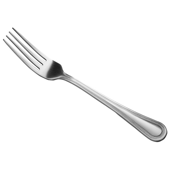 A Libbey stainless steel dinner fork with a silver handle.