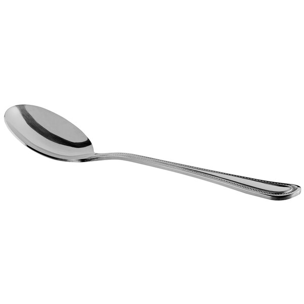 A Libbey stainless steel bouillon spoon with a silver handle.