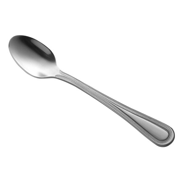 A Libbey stainless steel demitasse spoon with a silver handle.