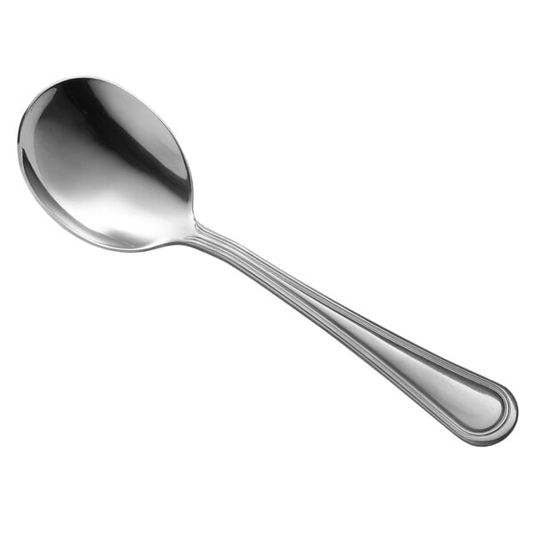 a silver spoon on a white background
