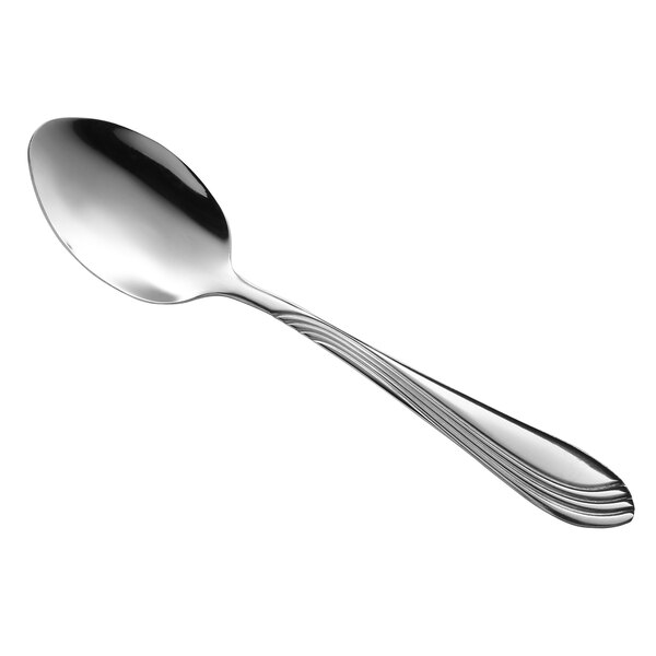 A Libbey stainless steel dessert spoon with a silver handle.