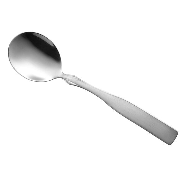 A Libbey stainless steel bouillon spoon with a silver handle.