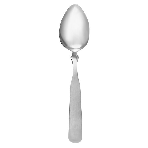 A Libbey stainless steel teaspoon with a white handle.