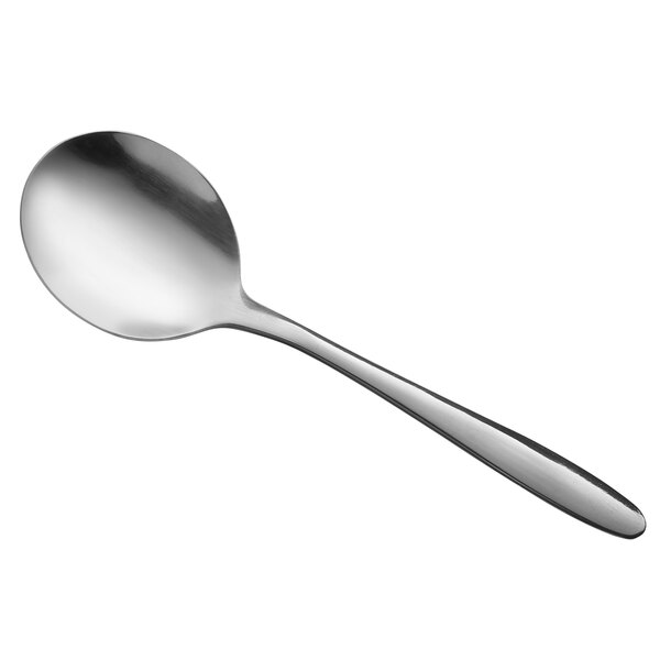A Libbey stainless steel bouillon spoon with a white handle.