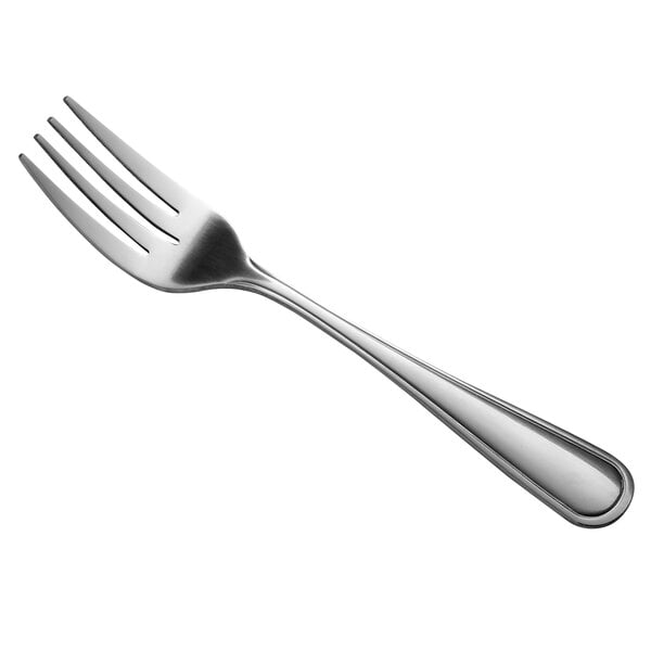 A close-up of a Libbey stainless steel salad fork with a silver handle.