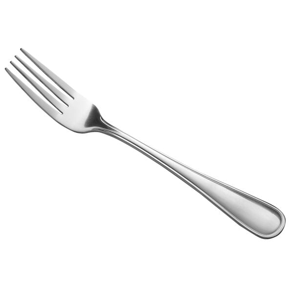 A close-up of a Libbey stainless steel dinner fork with a silver handle.
