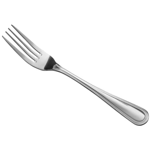 A close-up of a Libbey stainless steel dinner fork with a silver handle.