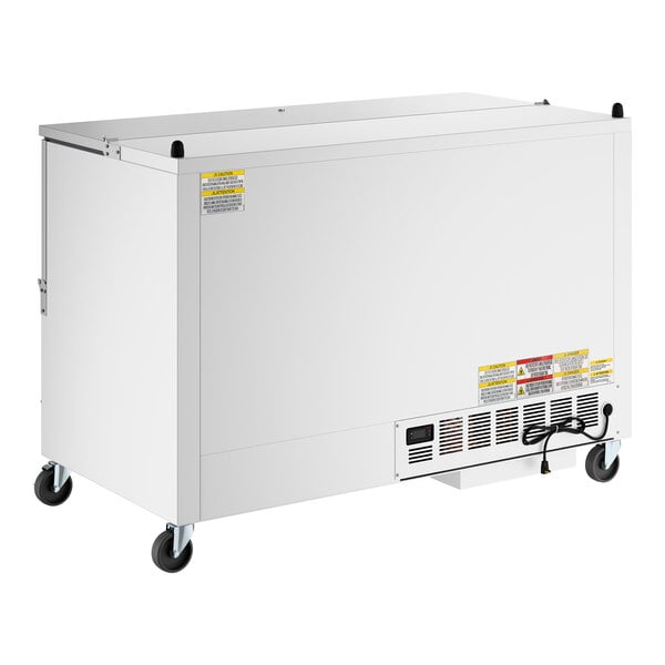 A white, one-sided cold wall milk cooler on wheels with a hinged lid and ventilation grates.