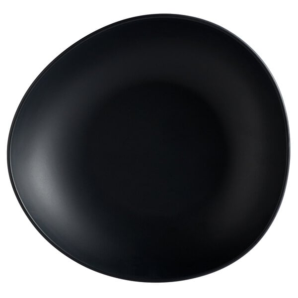 A dark gray irregular round matte melamine serving bowl.