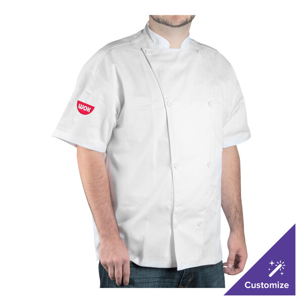 A man wearing a white Chef Revival chef jacket.