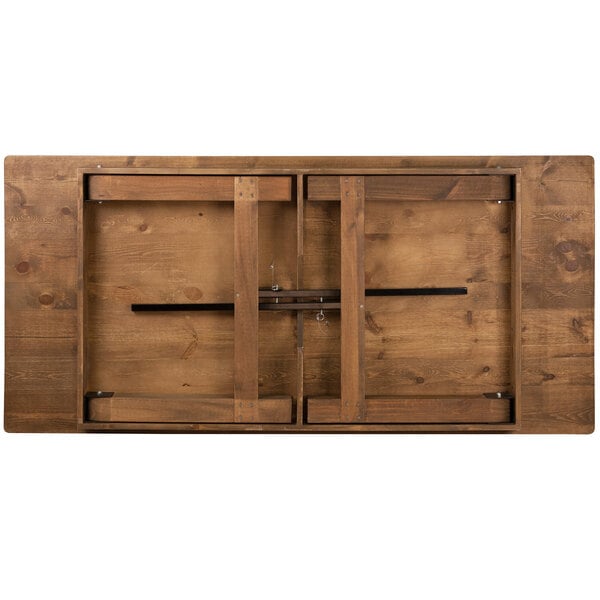 A Flash Furniture Hercules wooden folding farm table.