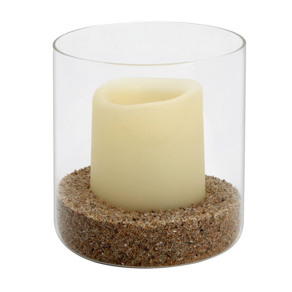 A Sterno Allure candle burning in a glass container.