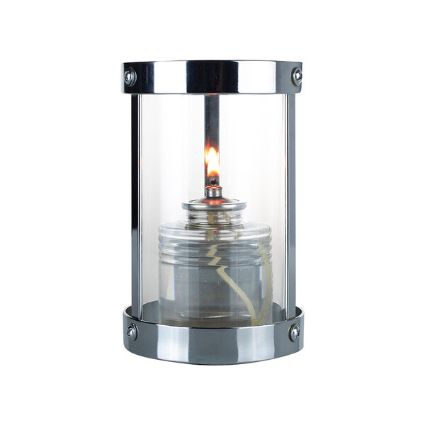 A close-up of a Sterno votive liquid candle holder. A glass and chrome wall light with a candle in a glass container.