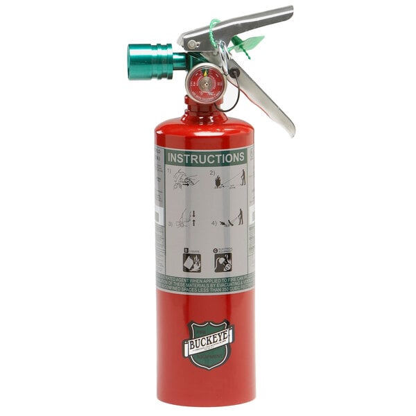 A red Buckeye fire extinguisher with a green handle.