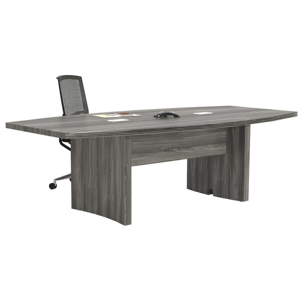 A Safco Aberdeen steel gray rectangular conference table with chairs around it.
