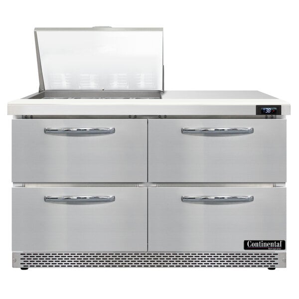 A stainless steel Continental Refrigerator with 4 drawers on top.