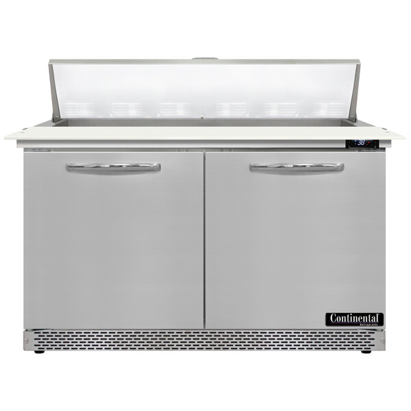 A stainless steel Continental Refrigerator with two doors and a cutting top.