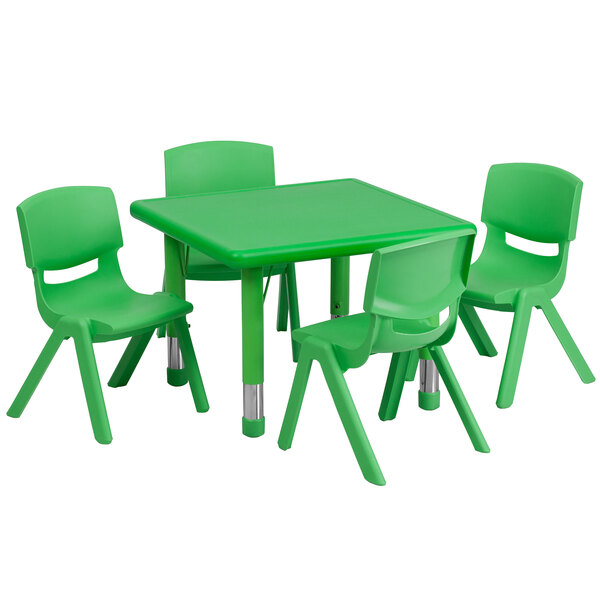 A green plastic table and chairs.